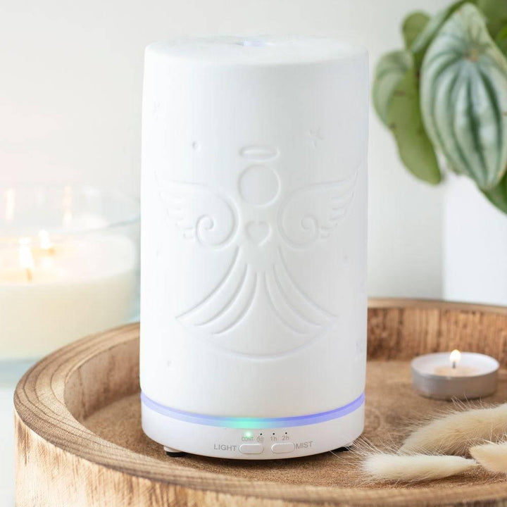 White Ceramic Guardian Angel Electric Aroma Diffuser - Home Decor Emporium