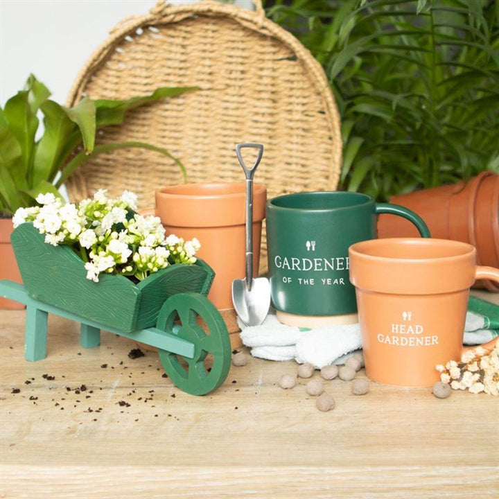 Green Resin Wheelbarrow Planter - Home Decor Emporium